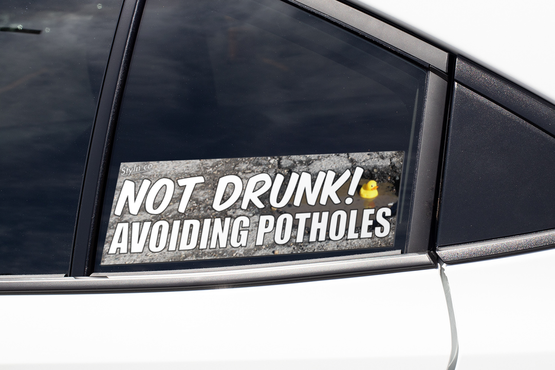 SLAP NOT DRUNK AVOIDING POTHOLES